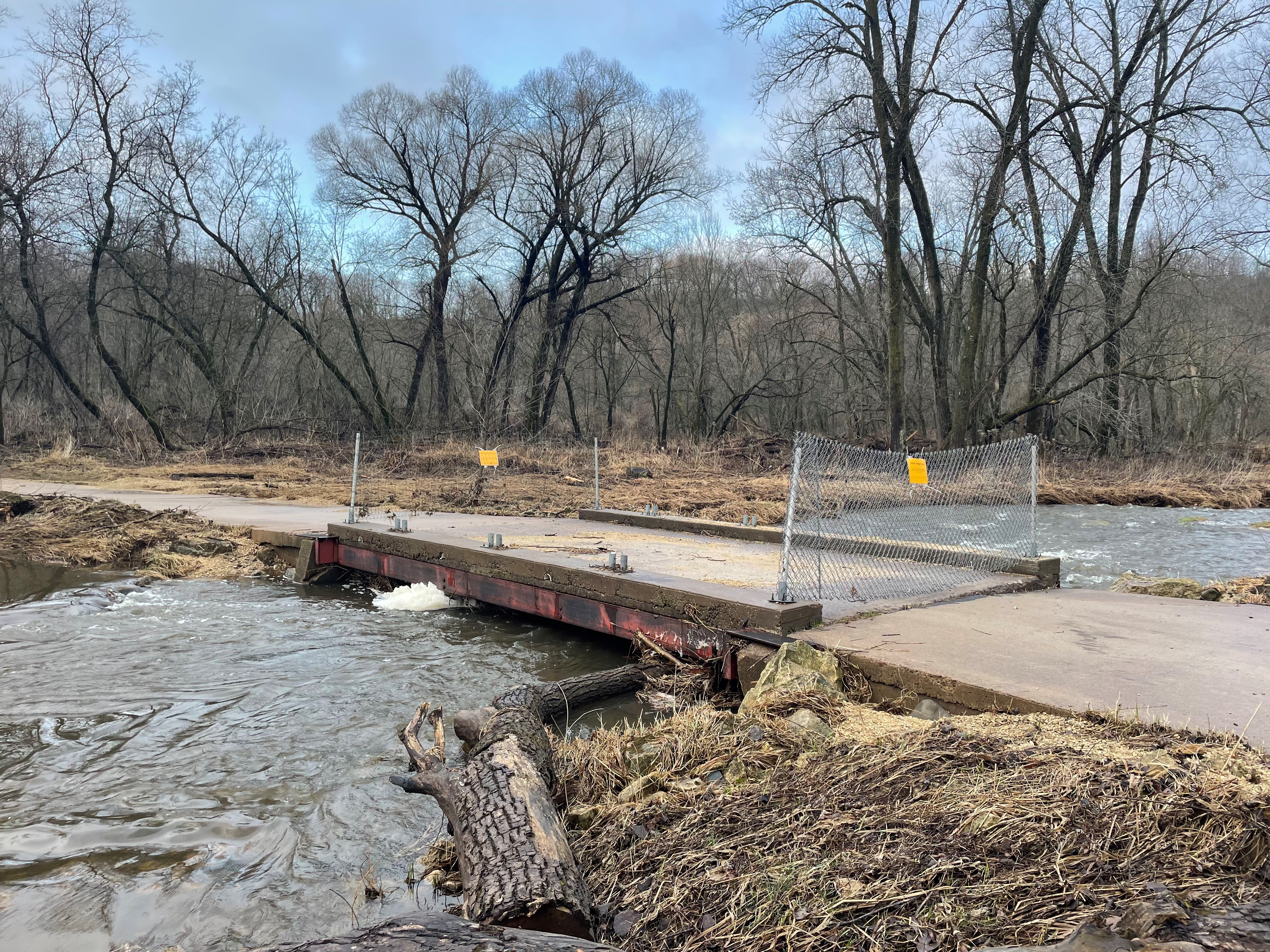 A closed bridge over a body of water